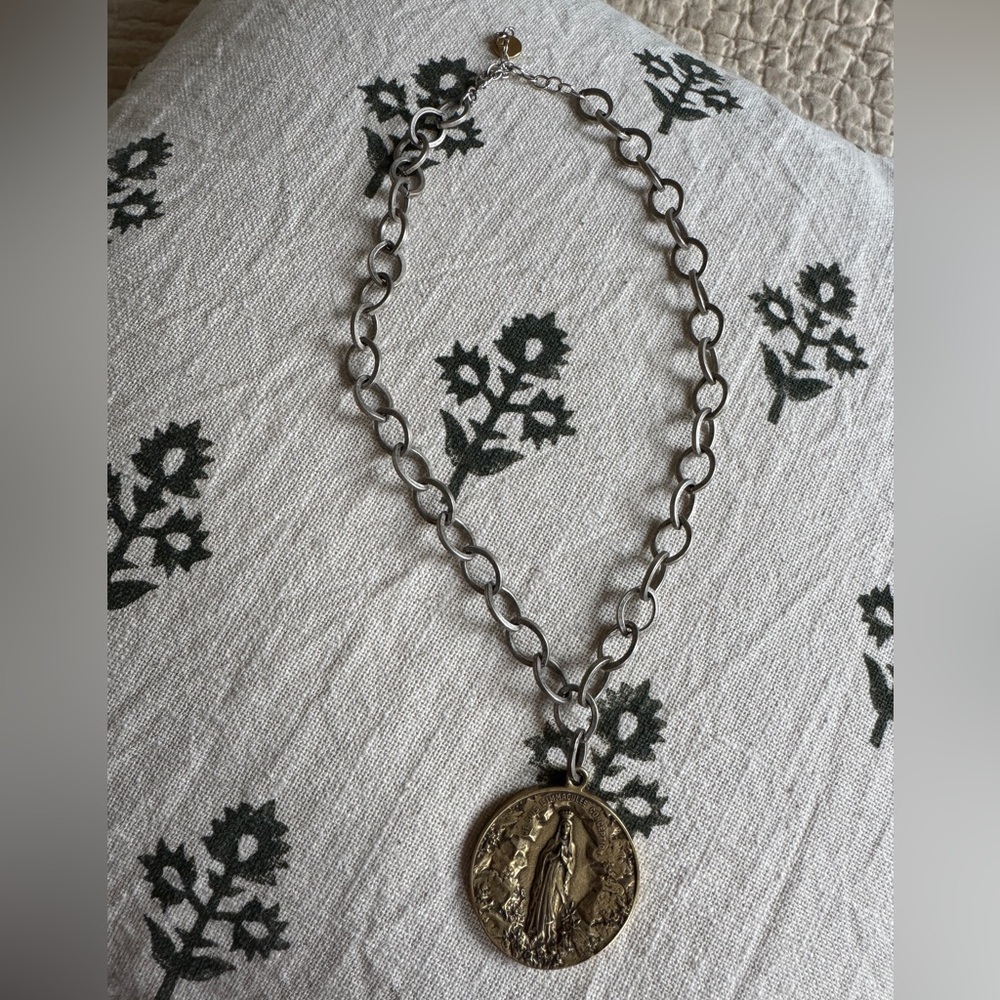 Chain necklace with adjustable connector and antique reversible silver pendants